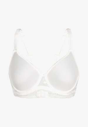Hvid bh med bøjle, glatte formede skåle, justerbare stropper og gennemsigtig blonde detaljering langs båndet. Prikker i bunden.