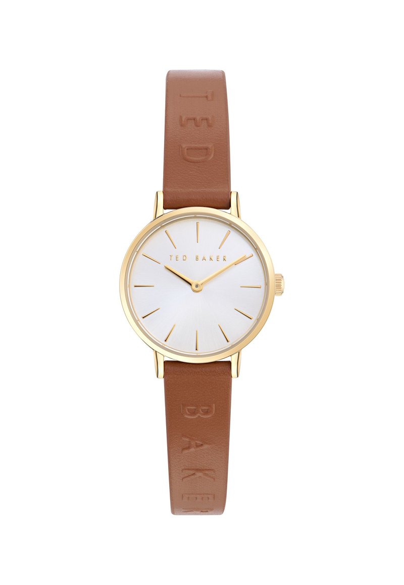 Montre ronde avec un boîtier en or, un cadran blanc et un bracelet en cuir marron avec un logo embossé sur la sangle. Design minimaliste et marquages.