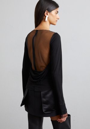 INSIDE OUT - A-snit nederdel - black
