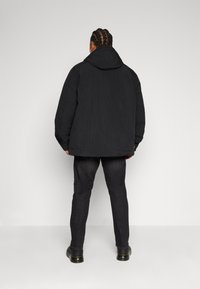 Tommy Jeans PADDED CHICAGO - Vinterjakke - black