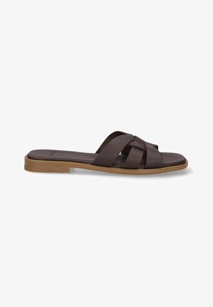 Brown flat slide sandal with crisscross leather straps and a light brown sole, shown from the side on a white background.