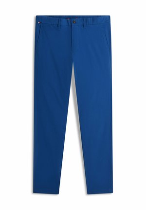 Pantalon homme bleu coupe slim avec fermeture à boutons et zip avant, poches latérales et passants pour ceinture, posé à plat sur fond blanc.