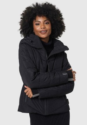 Black puffer jacket with a hood, featuring quilted texture, zipper front, and contrasting gray cuffs. Lightweight and insulated design.