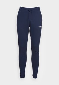 New Balance CLASSIC CORE Tracksuit bottoms pigment/dark blue