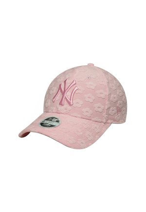 Pink New York Yankees cap featuring a textured floral pattern, embroidered logo in matching pink, and a curved visor for shade.