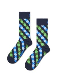 Ponožky po kolena v tmavě námořnické barvě s geometrickým vzorem, který se skládá z alternativně modrých a zelených kruhů. Slovo "HAPPY" je tkané modrou barvou.