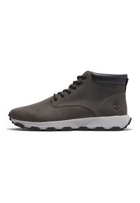 Gray leather ankle boots with black accents, textured surface, lace-up design, and a white rubber sole with black tread. Classic branding on side.