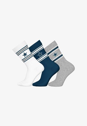 Three pairs of crew socks in white, navy, and gray, featuring striped designs and embroidered stars on the cuffs. Cotton blend texture.