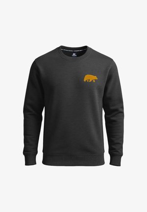 Schwarzer Sweatshirt mit Rundhalsausschnitt, ausgestattet mit einem kleinen orangenen Bärenmotiv auf der linken Brustseite. Hergestellt aus weichem, strukturiertem Stoff.