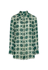 Blusa verde trasparente con un intricato motivo a catena geometrica bianca, chiusura frontale con bottoni, maniche lunghe e colletto classico.