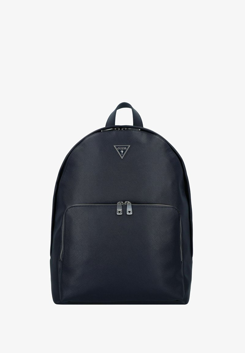 Zaino in pelle blu navy con texture liscia, forma arrotondata, tasca frontale con zip e triangolo logo metallico. Doppie cerniere per una chiusura sicura.