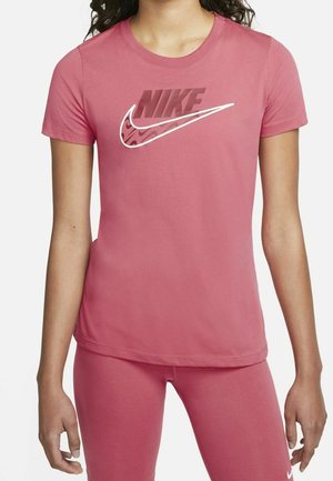 T-shirt Nike rose à manches courtes, avec un grand logo graphique en rose foncé et blanc. Confectionné dans un tissu lisse et extensible.