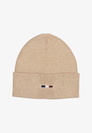 Beige ribbet strikket hue med foldet manchet, prydet med et lille horisontalt tricolor-logo i marineblå, hvid og burgunder.