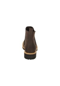 Braune Leder-Stiefelette mit elastischen Seiteneinsätzen, runder Zehenform und einer strukturierten Gummisohle. Verfügt über eine Schlaufe zum leicht Anziehen.