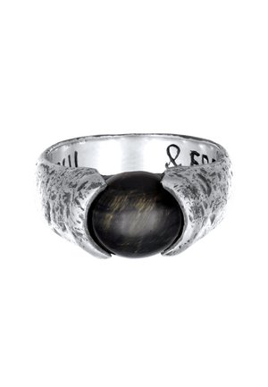 Silver ring with a textured band, featuring a dark spherical stone in a claw-like setting. Internal inscription visible.