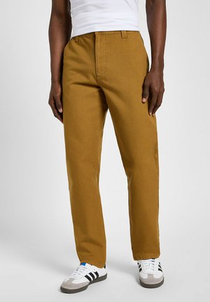 Khaki byxor i bomullstwill med raka ben, stadig sömnad och minimalistisk stil för mångsidig användning.