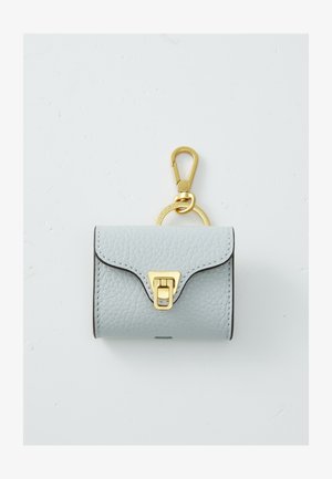 Light blue leather keychain wallet with gold hardware, featuring a clasp and a decorative keyring. Textured surface with a curved flap design.