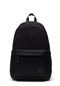Black backpack made of durable fabric, featuring a diamond logo, front zip pocket, and padded shoulder straps. Simple, functional design.