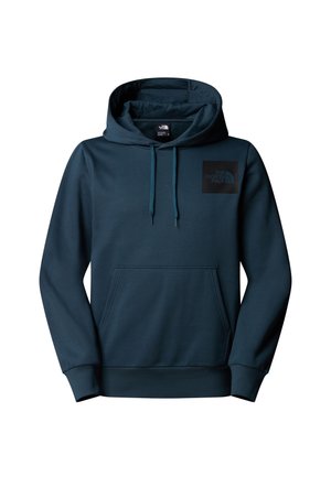 Capuchon sweatshirt in donker teal met een voorkennis. Bevat een zwart logo patch op de borst. Gemaakt van een zachte, gestructureerde stof.