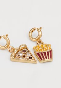 Gold-tone charm earrings featuring a pizza slice and French fries. Pizza has rhinestone accents; fries are colored yellow and red.