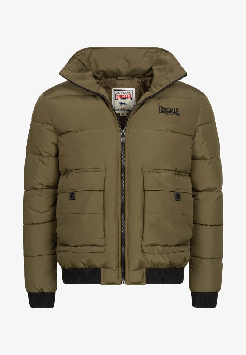 Olive green puffer jacket with a high collar, front zipper, and two large flap pockets. Features a black logo and ribbed cuffs and hem.