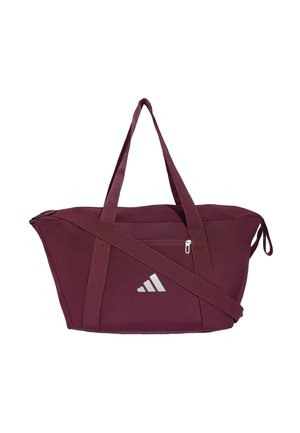 Bordeauxfarvet Adidas duffel taske med to top-håndtag, en justerbar skulderrem, front lynlåslomme og hvid Adidas-logo.
