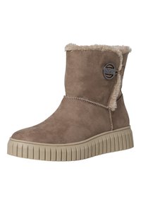 Beige suède enkellaars met een zachte bontvoering, zijknop-details en een geribbelde rubberen zool voor grip. Middenhoge ontwerp.