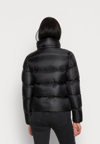 Calvin Klein Jeans Dunjakker - black