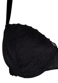 Black lace bra with a textured floral pattern, molded cups, thin adjustable straps, and a scalloped edge along the top.