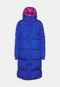 Long puffer coat in blue with a pink inner lining. Features a hood, snap buttons, and quilted sections for insulation.