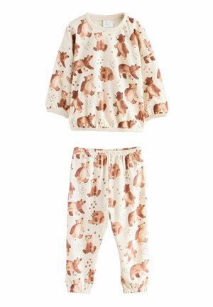 Cream-colored baby pajamas with long sleeves and pants, decorated with various brown bear illustrations in different poses.