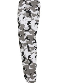 Graue und weiße Camouflage-Jogginghosen mit einem kontrastierenden schwarzen Muster, aus weichem Stoff gefertigt, mit einem schmal zulaufenden Bein-Design und elastischem Bund.