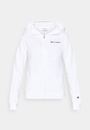 Biała bluza z kapturem na zamek wykonana z miękkiego materiału, z przednią kieszenią, kapturem ze sznurkiem oraz granatowym logo Champion na lewej piersi.