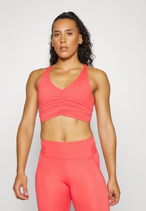 ULTRA SOFT STRAPPY CROP - Light support sports bra - coral burst