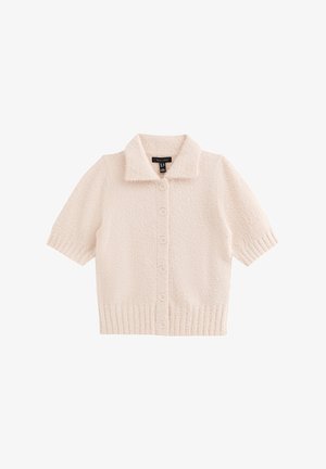 Kurzärmelige, kragenlose Strickjacke aus weichem, cremefarbenem Stoff mit strukturierter Oberfläche. Verfügt über eine Knopfleiste vorne und einen gerippten Saum.