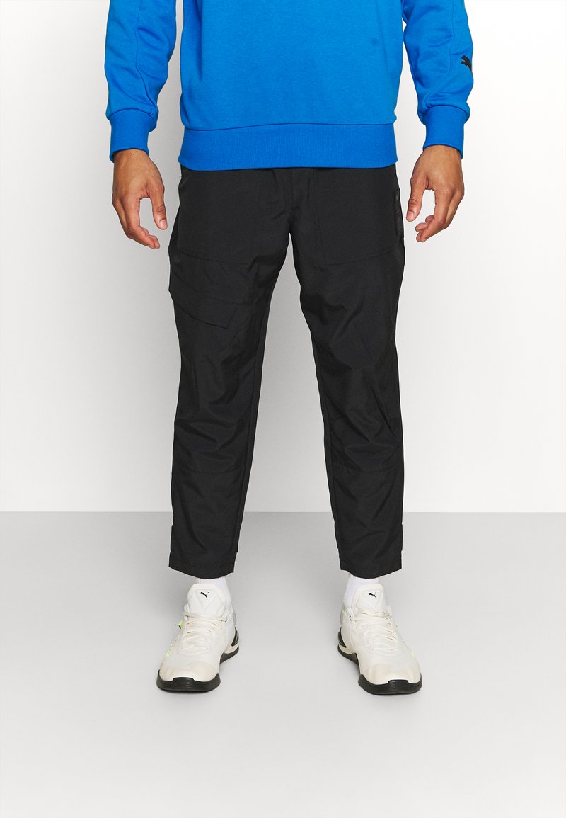 Puma TRAIN FIRST MILE PANT Tracksuit bottoms black Zalando.de