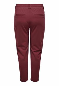 Viininpunaiset stretch-housut, joissa on sileä pinta, joustava vyötärönauha ja kaksi takataskua; kapeat lahkeet istuvan ilmeen takaamiseksi.