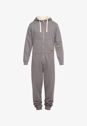 Szary kombinezon z zamkiem z przodu, kapturem i kremowymi akcentami. Posiada prążkowane mankiety i kieszeń z przodu. Materiał wydaje się miękki i gładki.
