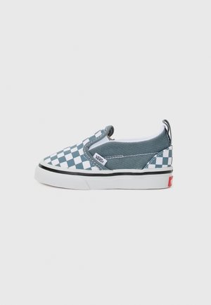 Slip-on sneakers med ett rutmönster i blått och vitt, med en ovandel i kanvas, gummisula och svarta detaljer. Röd logotypdetalj.