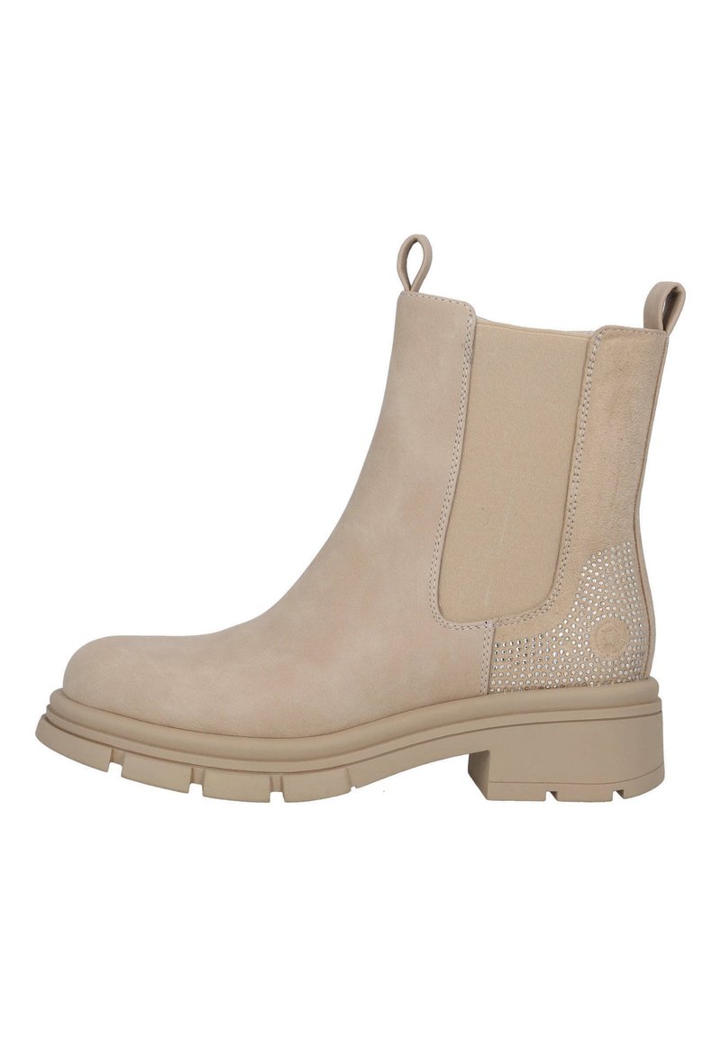 Bottine beige avec panneaux élastiques sur les côtés, en daim texturé et semelle en caoutchouc. Présente des clous décoratifs à l'arrière et une languette.