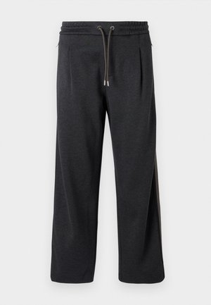 Pantaloni jogger grigio scuro con una texture morbida, vita elastica, chiusura con coulisse e cuciture laterali con accenti a contrasto. Design a gamba larga.
