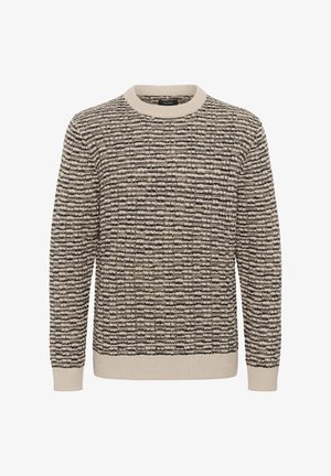 Gebreide trui met een gestructureerd patroon in beige en zwart, met een ronde hals en geribbelde manchetten en onderzoom.