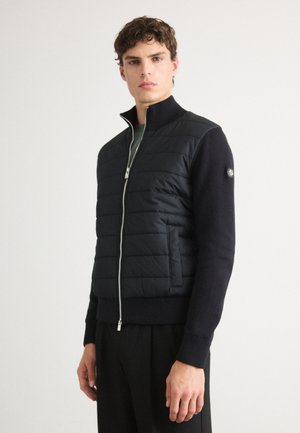 HERNESTO - Lengva striukė - black