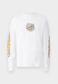 White long-sleeve T-shirt featuring a central graphic with flames and dice, complemented by flame graphics on each sleeve. Cotton material.