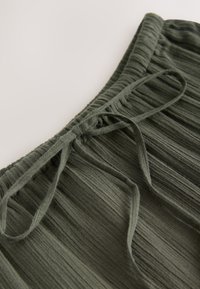 REGULAR FIT-BOHO TIERED MIDI - A-line skirt - khaki/green