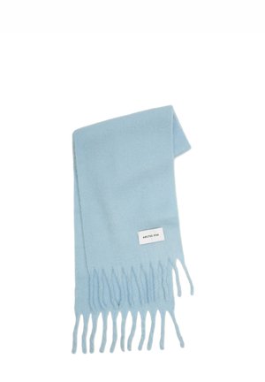Light blue scarf made of soft fabric, featuring fringe edges and a small white label with "ARCTIC FOX" text.