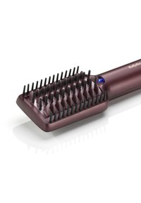 Elektrische Haarbürste mit einem rechteckigen, burgunderfarbigen Gehäuse, weichen Gummi-Borsten und einer blauen Anzeigeleuchte. Strukturierter Griff für Komfort.