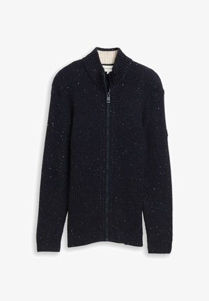 Pulover cu fermoar de culoare bleumarin, cu textură canelată și fire colorate. Dispune de un guler înalt și cusături laterale pentru o formă ajustată.