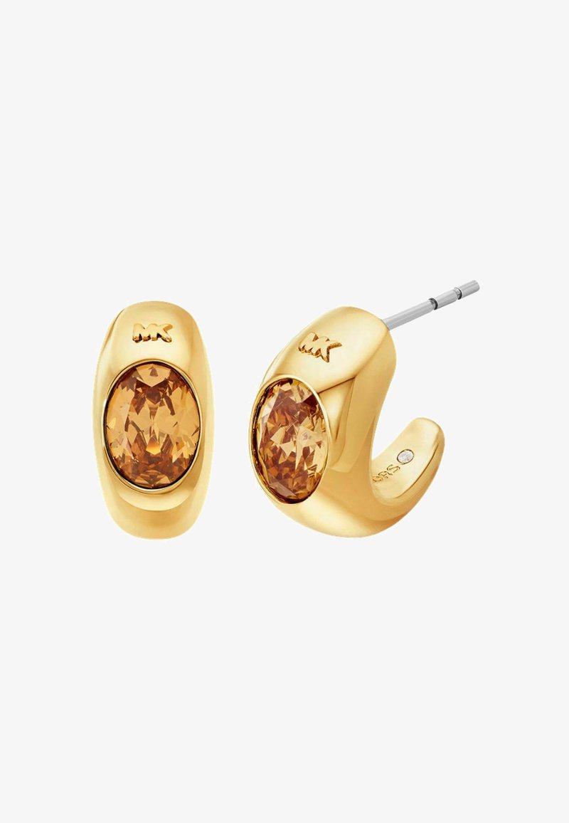 Pendientes de aro dorados con cristales ovalados de color naranja claro. Presentan un acabado brillante y un logotipo grabado. Cierre de palanca con herrajes seguros.