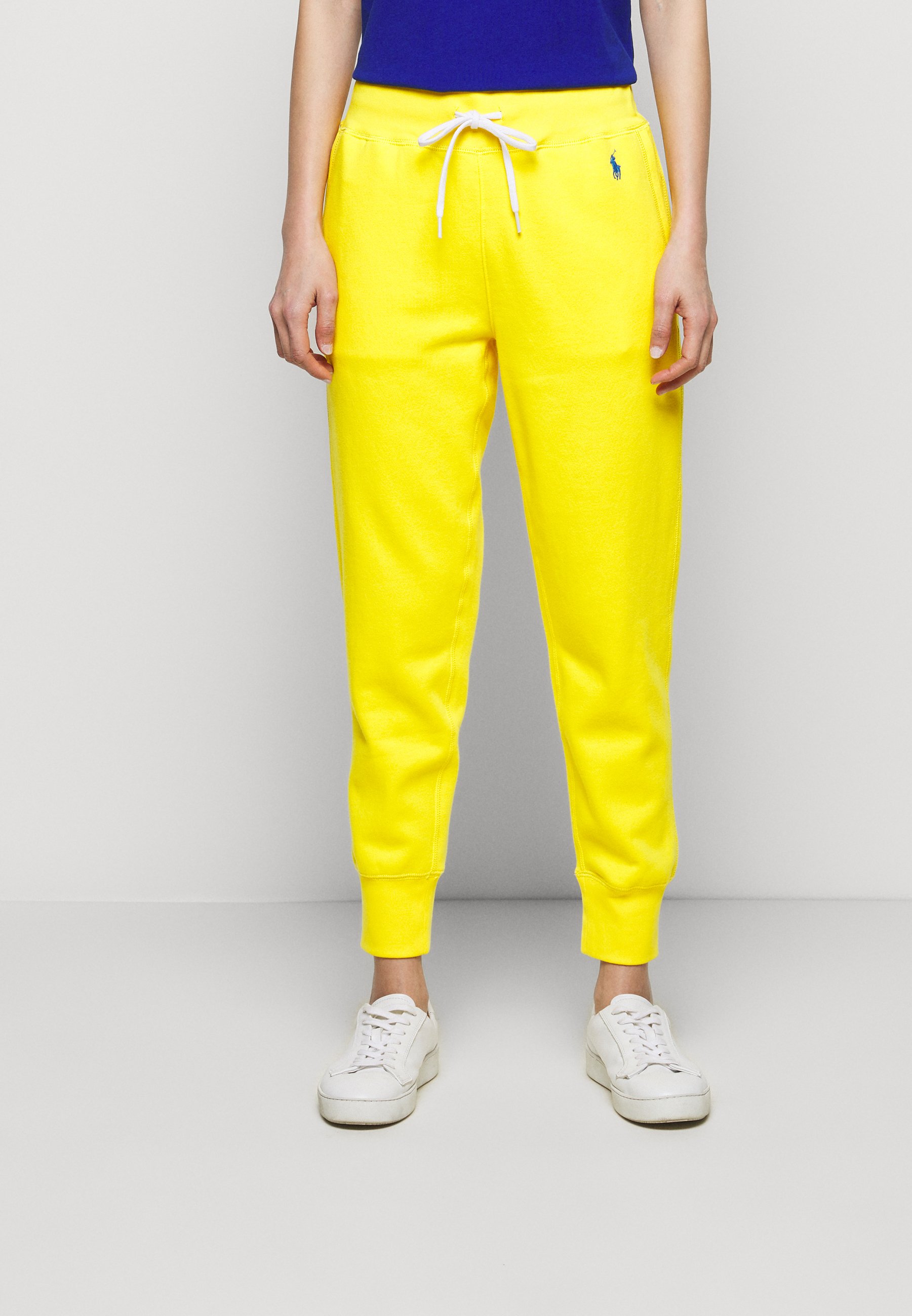 Polo Ralph Lauren Pantaloni sportivi - university yellow/giallo - Zalando
